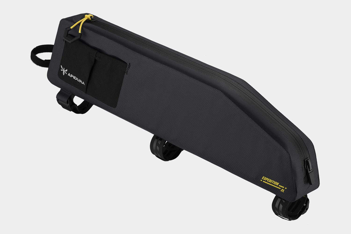 Apidura Expedition Long Top Tube Pack (2L) from the opposite side showing the full-length waterproof zip